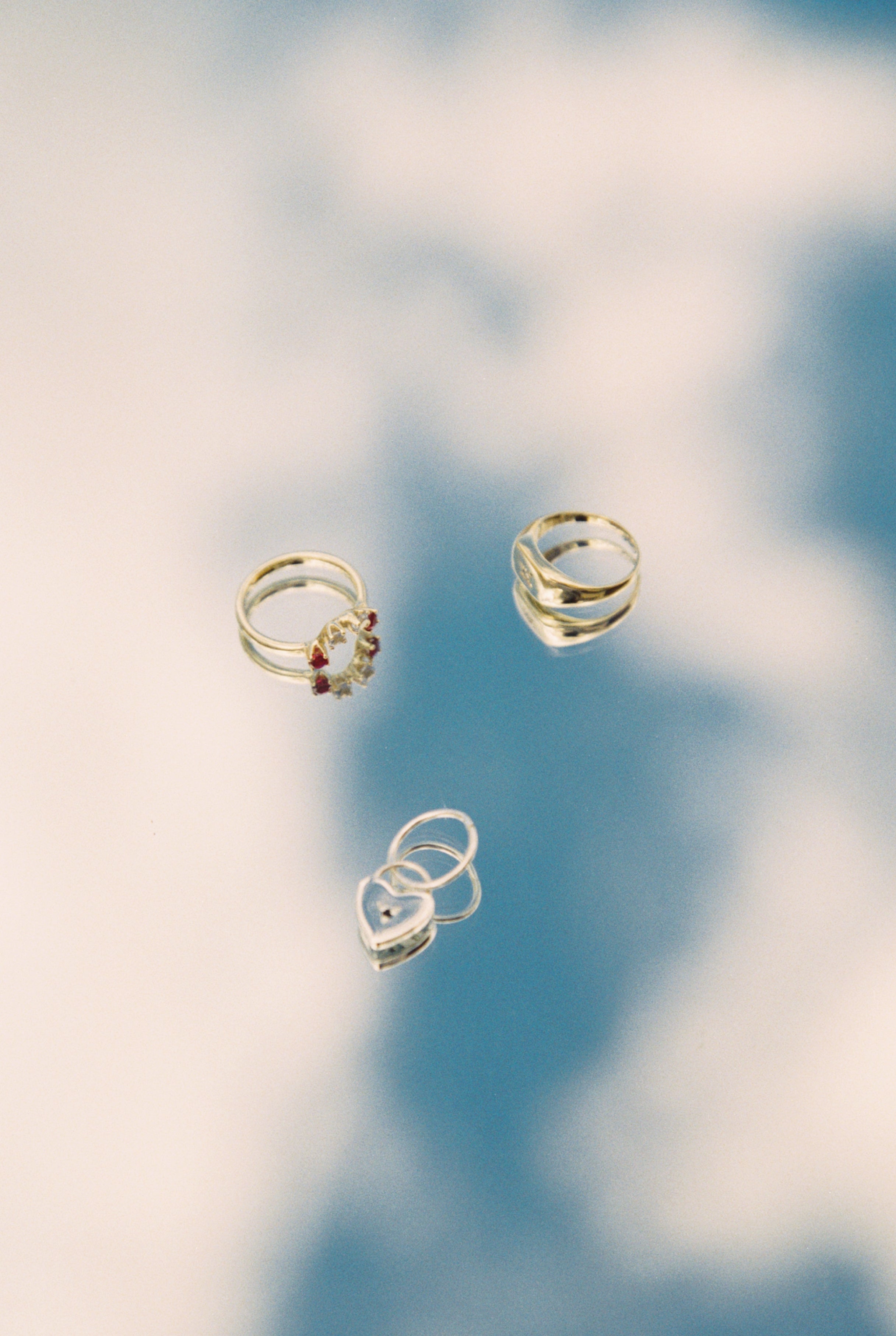 Four Stone Ring ~ Blue Topaz & Ruby CZ